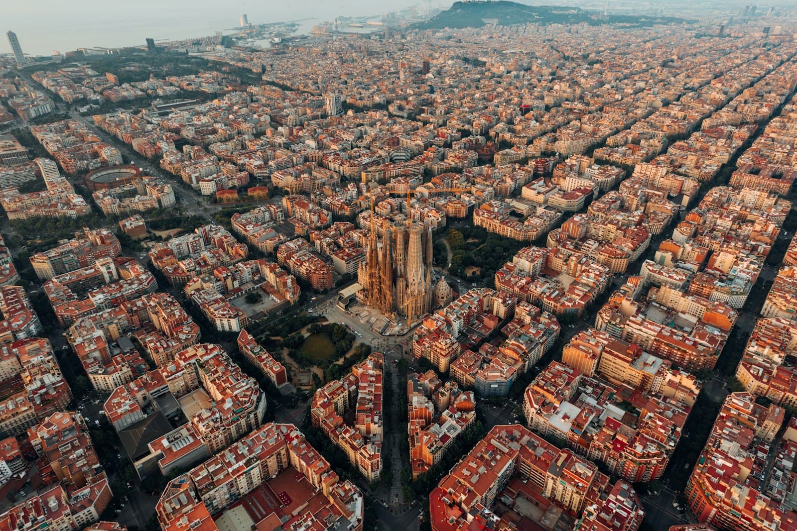 Aerial view of Barcelona’s Eixample grid and the Sagrada Família